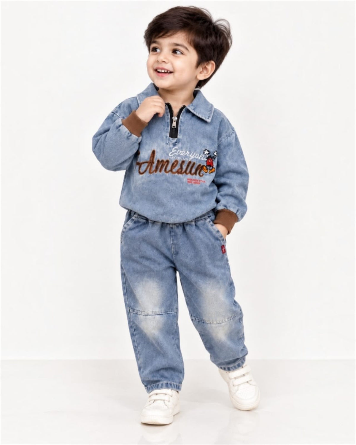Boy wearing embroidered denim co-ord set